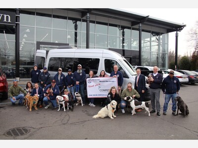 Local Smithtown Car Dealership Gives Back to Paws of War 